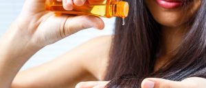 Apply oil to your scalp to prevent hair loss