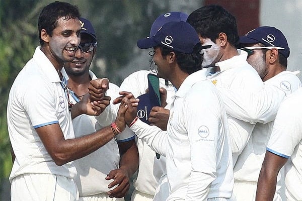 Aravind four wickets helps Karnataka top South Zone 3
